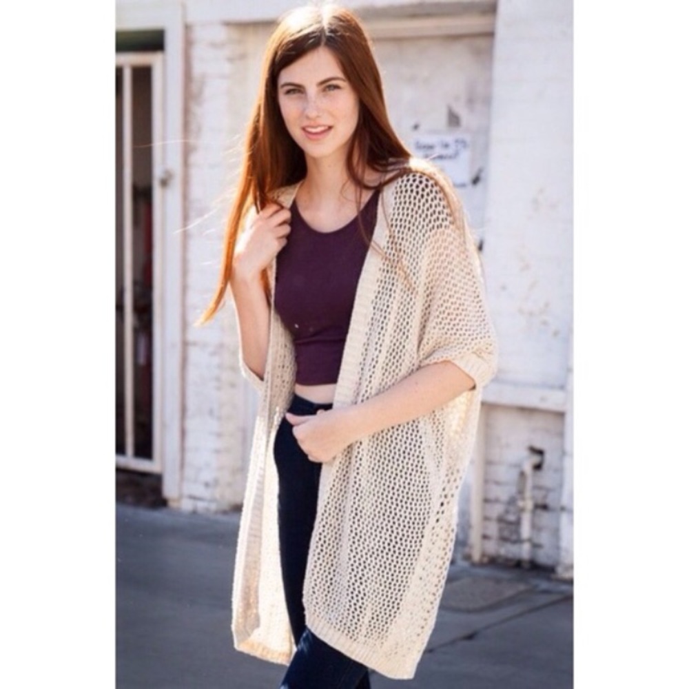 Brandy Melville beige knit sweater.